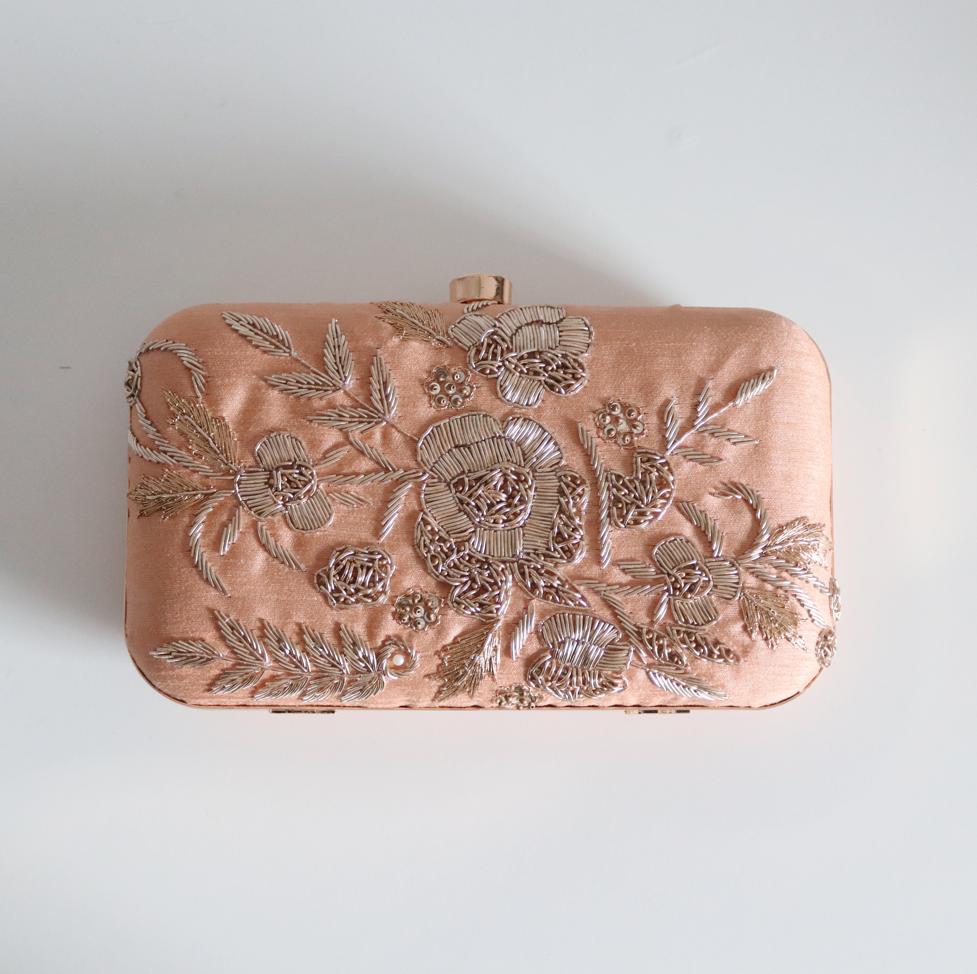 Rose gold store embellished bag